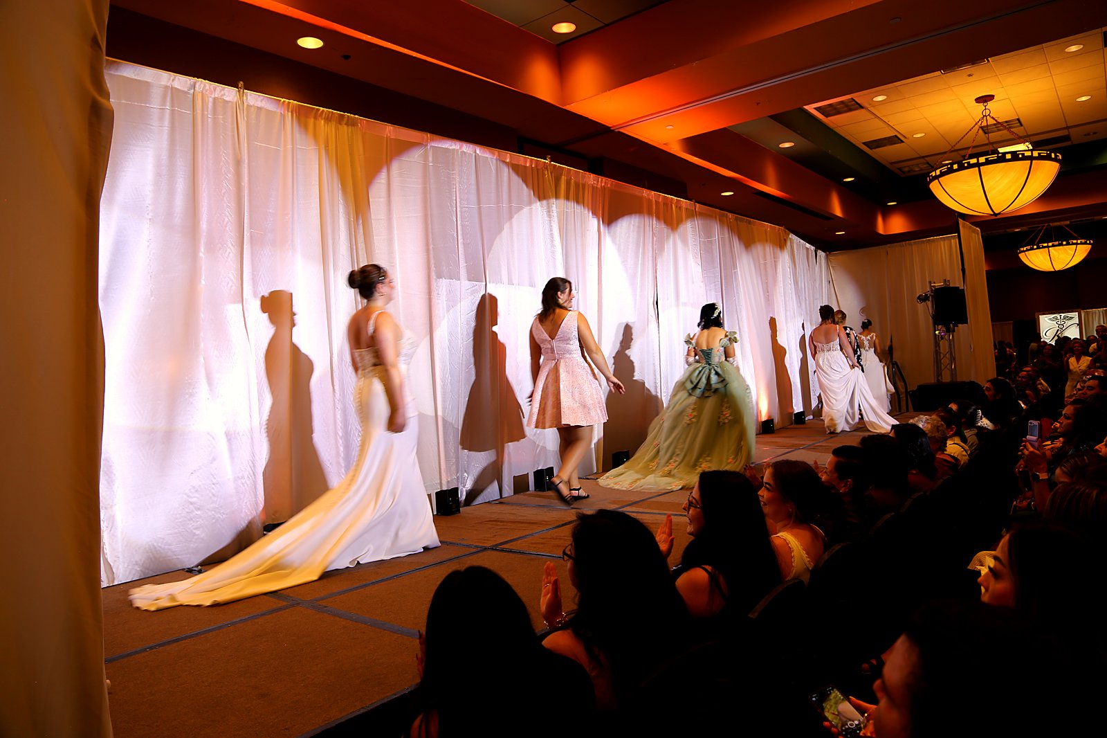 Models walking the runway at the New Mexico Wedding Expo fashion show